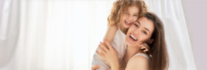 Stock Image of Mother and Daughter Smiling