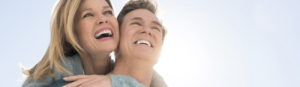 Stock Photo of Smiling Couple for Laser Gum Treatment