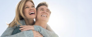 Smiling Couple for Dental Laser Gum Treatment