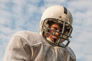 Stock Photo of Football Player with Helmet